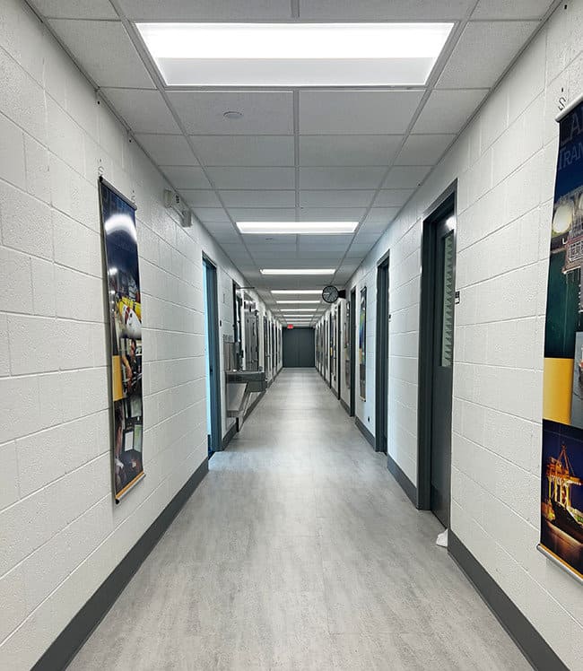 Second floor hallway with new floors and paint. 